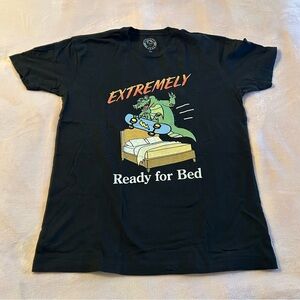 Extremely Ready For Bed black t-shirt with alligator skateboarding over a bed M